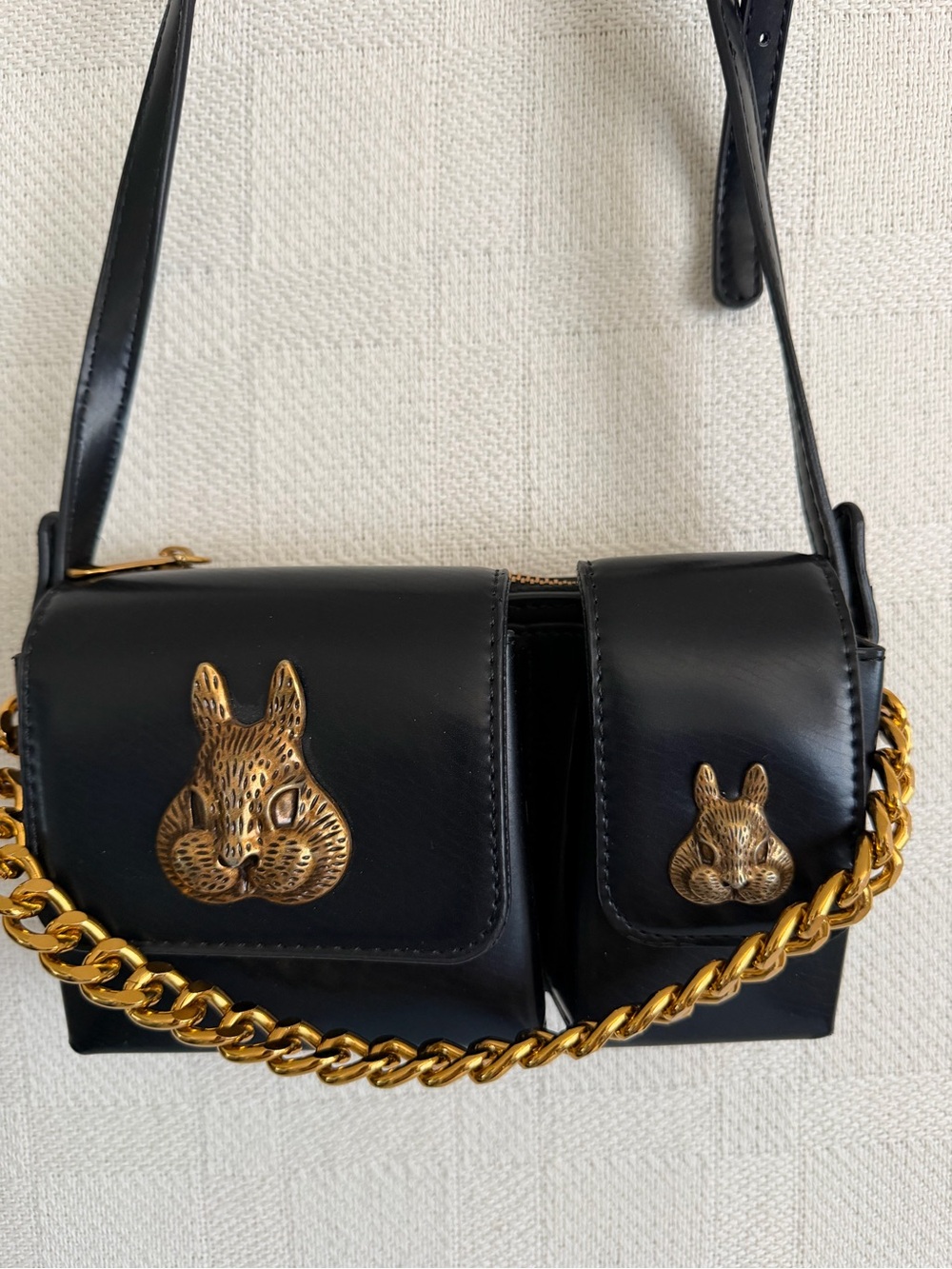 Black Crossbody Bag with Gold Rabbit Embellishments